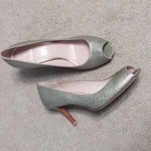 VGUC Stuart Weitzman silver metallic peep toe pumps with wood heels